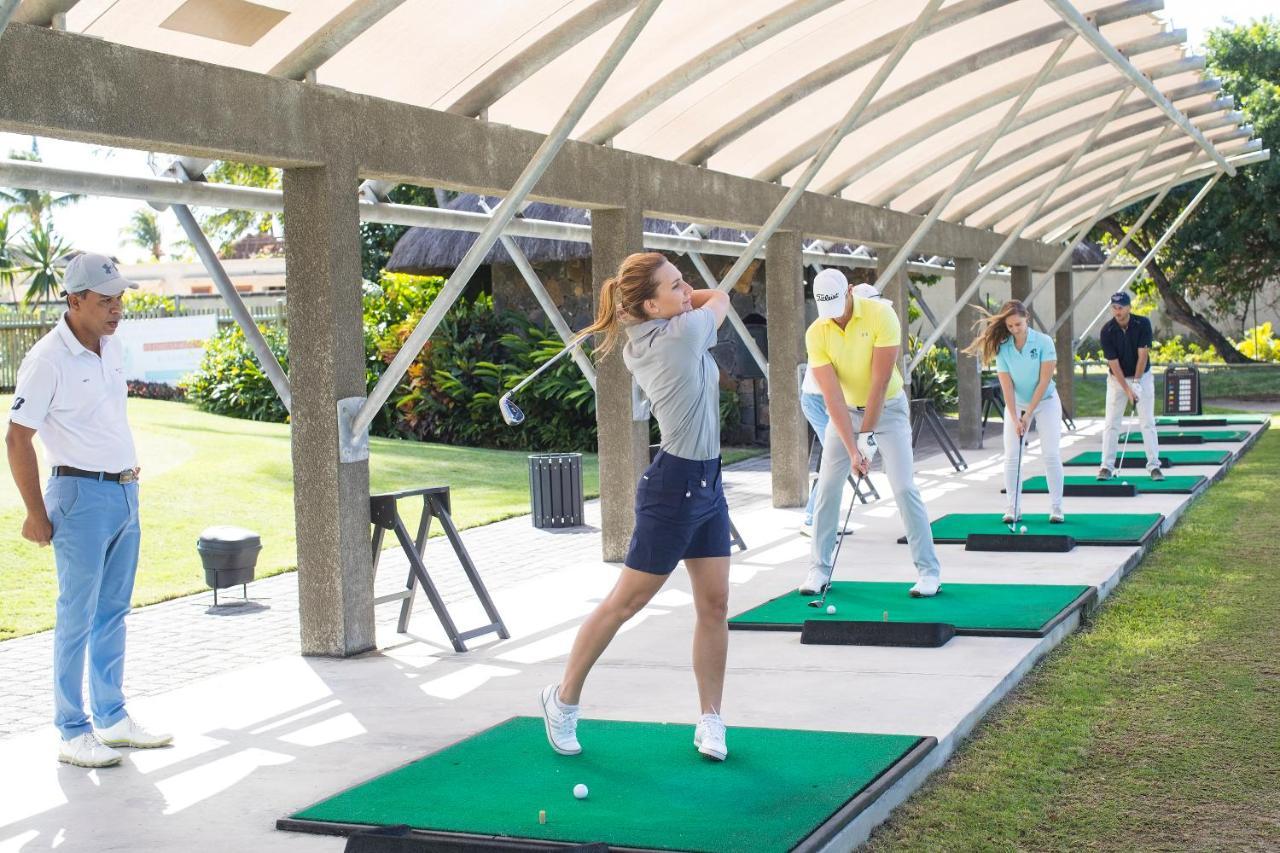 Constance Prince Maurice Poste de Flacq Екстериор снимка Golfers practicing at a driving range